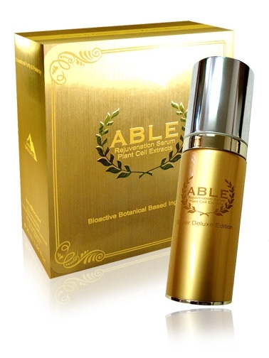 Caja y frasco dorado de ABLE Rejuvenation Serum